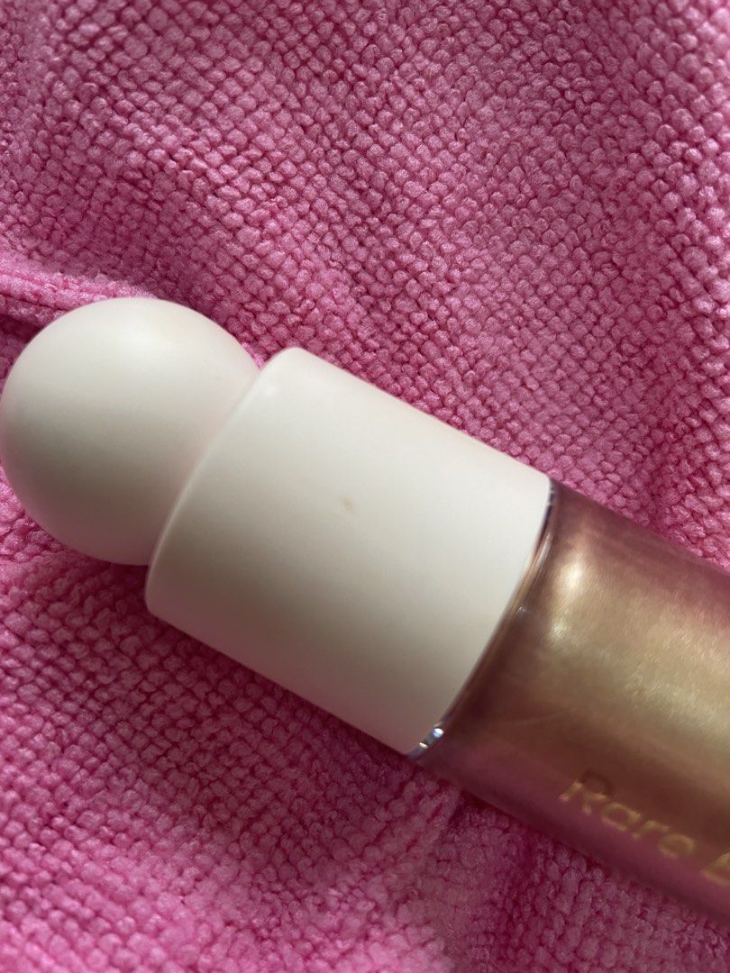 Rare Beauty Liquid Luminizer Highlighter in Flaunt (Category: Makeup) located in Quezon City. Submitted by gems4sale (Listing ID 1463148023, Image 3). Description: As is All makeup are sanitized I always care for my products RFS: Decluttering too much makeup items.