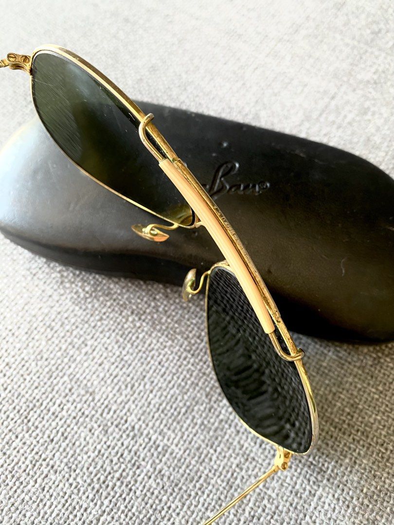Vintage Ray-Ban B&L Shooter Aviator Sunglasses (Category: Sunglasses & Eyewear) located in Makati City. Submitted by lucid_soul (Listing ID 1463166041, Image 2). Description: - Vintage Ray-Ban Shooter Aviator sunglasses - Made in USA - Gold frame with green lenses - Smooth movement: All parts working - Great condition for a vintage piece - Comes with original Ray-Ban hard case - Timeless and iconic style - Vintage Mojo included .