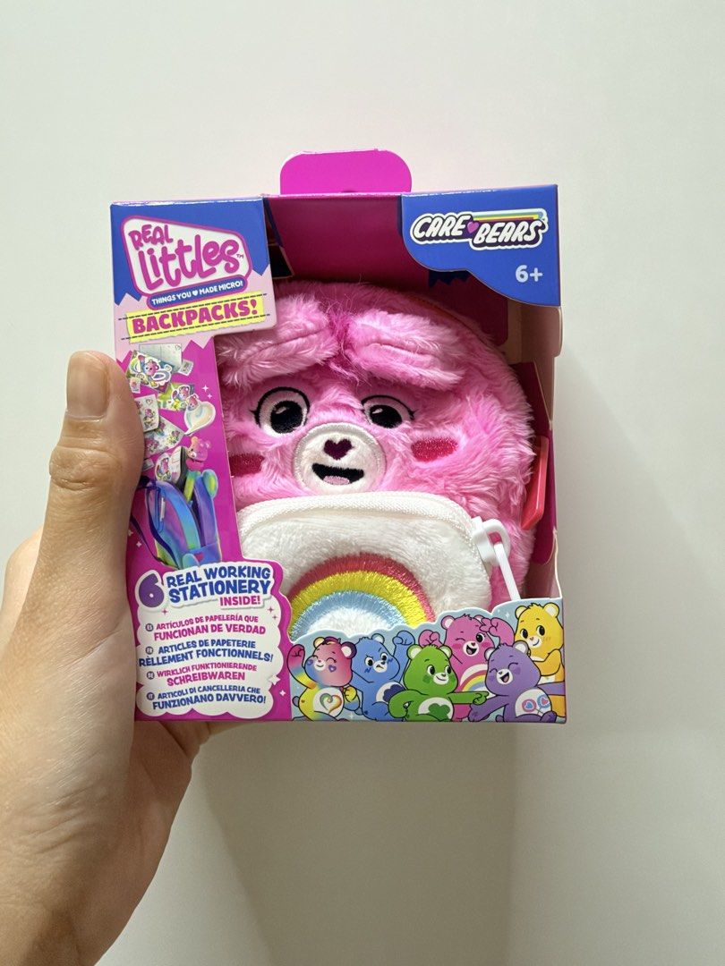 Real Littles Care Bears Backpack - Cheer Bear (Category: Stationery & School Supplies) located in Paranaque City. Submitted by jcbt0211 (Listing ID 1463297587, Image 1). Description: - Adorable pink Care Bears mini backpack stationery set. - Backpack opens up to reveal contents. - Includes: pen, stickers, mini notebook, and other fun items. - Ideal for children or any Care Bears enthusiast. - Comes in its original, unopened box..