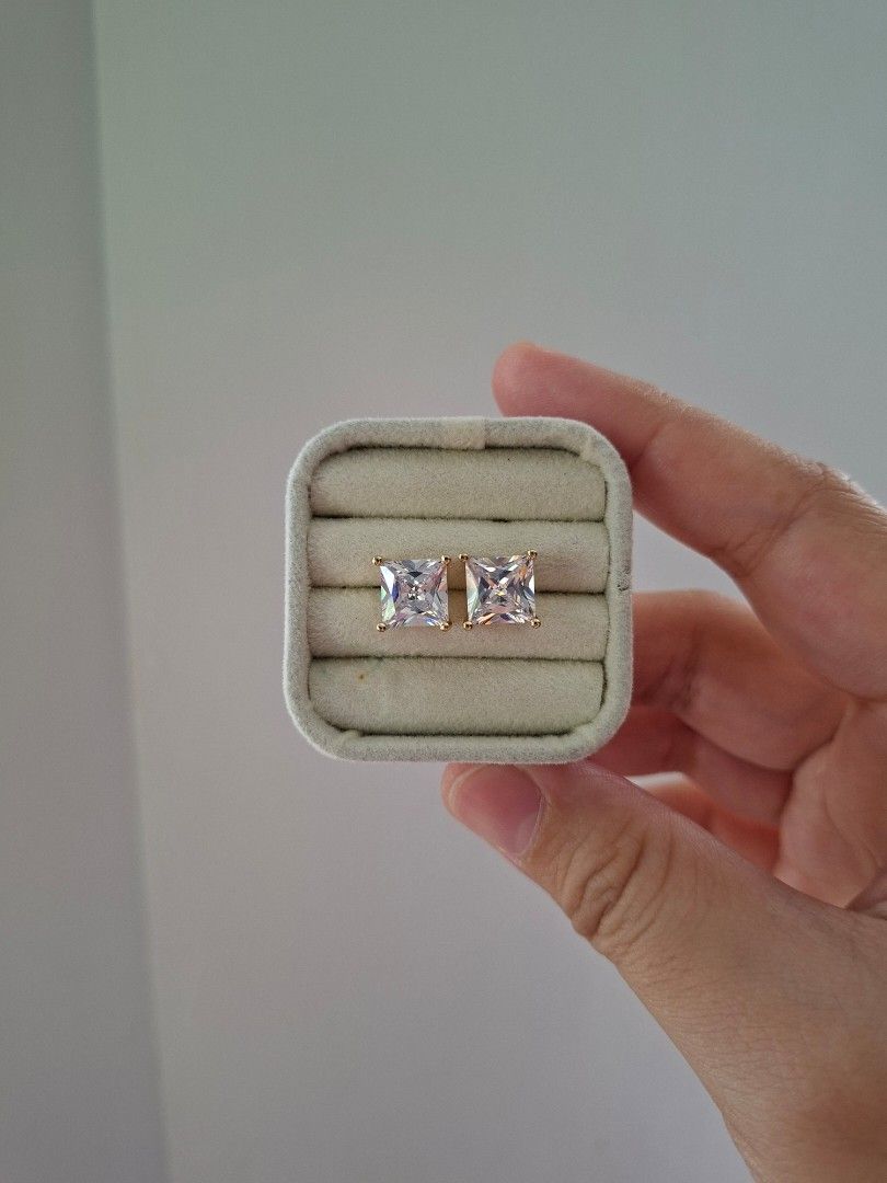 Rectangular Cut Stone Large Gold Stud Earrings (Category: Earrings) located in Dasmarinas. Submitted by danabrie22 (Listing ID 1463326088, Image 2). Description: very sparkly in person! high cubic zirconia stone used very well-made, excellent crafstmanship 10/10 condition brand new stainless steel & white crystal-colored cubic zirconia stones made in Hongkong.