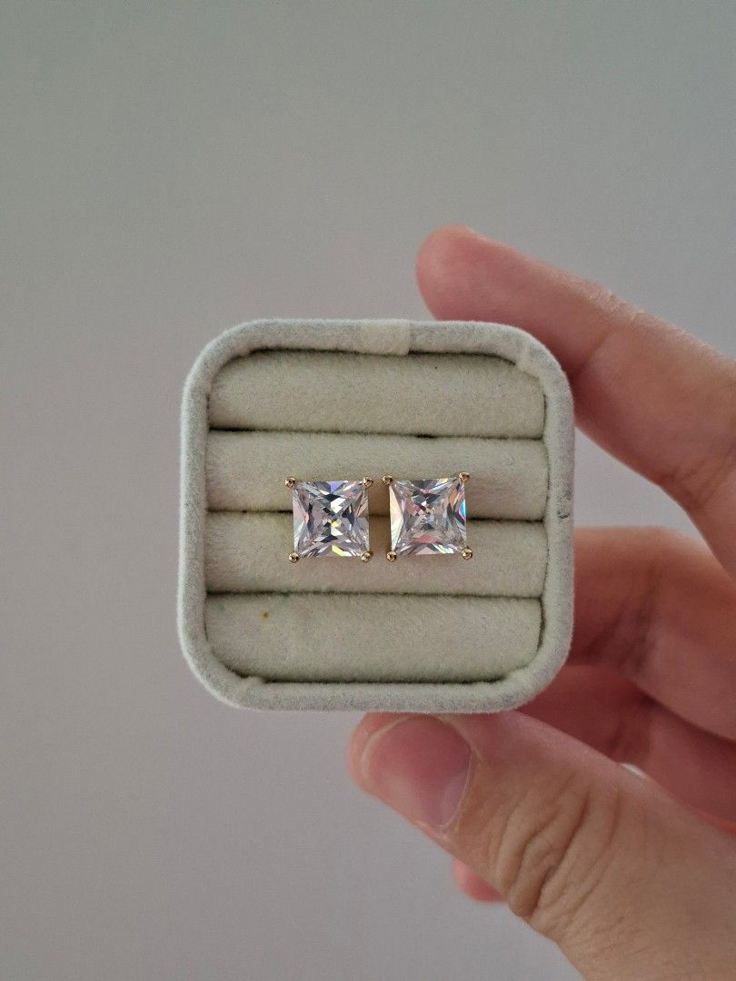 Rectangular Cut Stone Large Gold Stud Earrings (Category: Earrings) located in Dasmarinas. Submitted by danabrie22 (Listing ID 1463326088, Image 1). Description: very sparkly in person! high cubic zirconia stone used very well-made, excellent crafstmanship 10/10 condition brand new stainless steel & white crystal-colored cubic zirconia stones made in Hongkong.