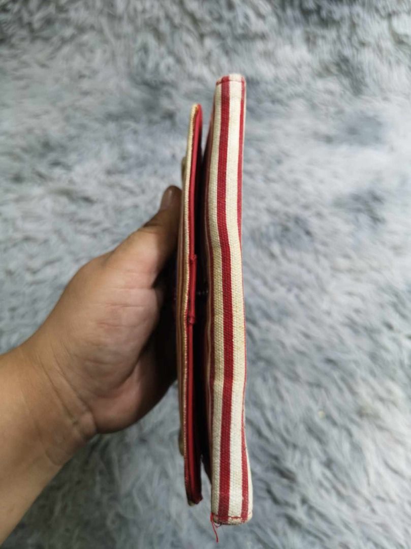 Red & White Striped Snap Closure Long Wallet (Category: Wallets & Card holders) located in Santa Cruz. Submitted by jmy_surplus.2 (Listing ID 1463245107, Image 2). Description: Size ; L - 4.4 W - 7.4 Color ; White , Red Type ; Wallet Brand ; No brand Material ; Synthetic Style ; Stripe Pattern Long Wallet LR 129 JMY 4 Batch #223.