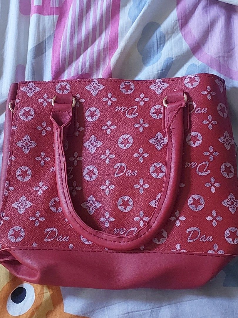 red bag (Category: Luxury Bags & Wallets) located in Las Pinas. Submitted by g.bonx (Listing ID 1463201013, Image 2). Description: red bag ( unknown brand ) °MOP: gcash °MOD: jnt DM for more further details.