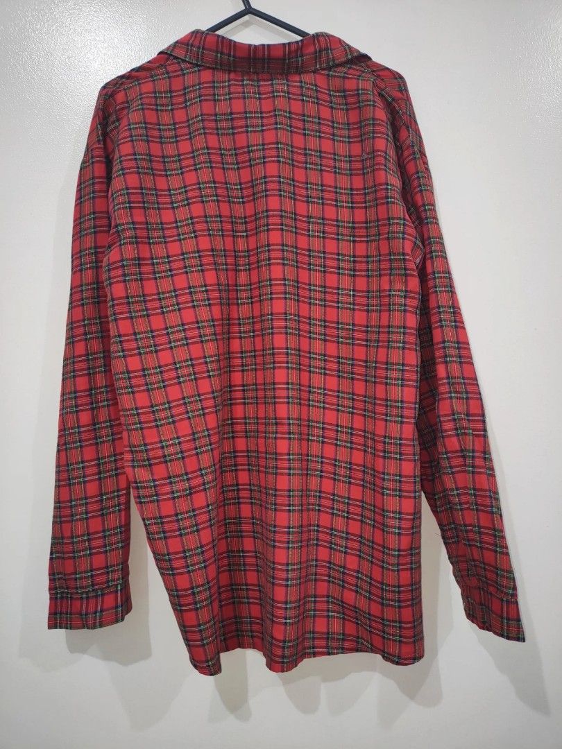 Red Plaid Long Sleeve Button Up Shirt (Category: Tshirts & Polo Shirts ) located in Quezon City. Submitted by maxsab (Listing ID 1463264777, Image 3). Description: - Classic red plaid pattern - Long sleeves with button cuffs - Single chest pocket - Button-up front - Versatile for layering or standalone wear - Comfortable and casual style.