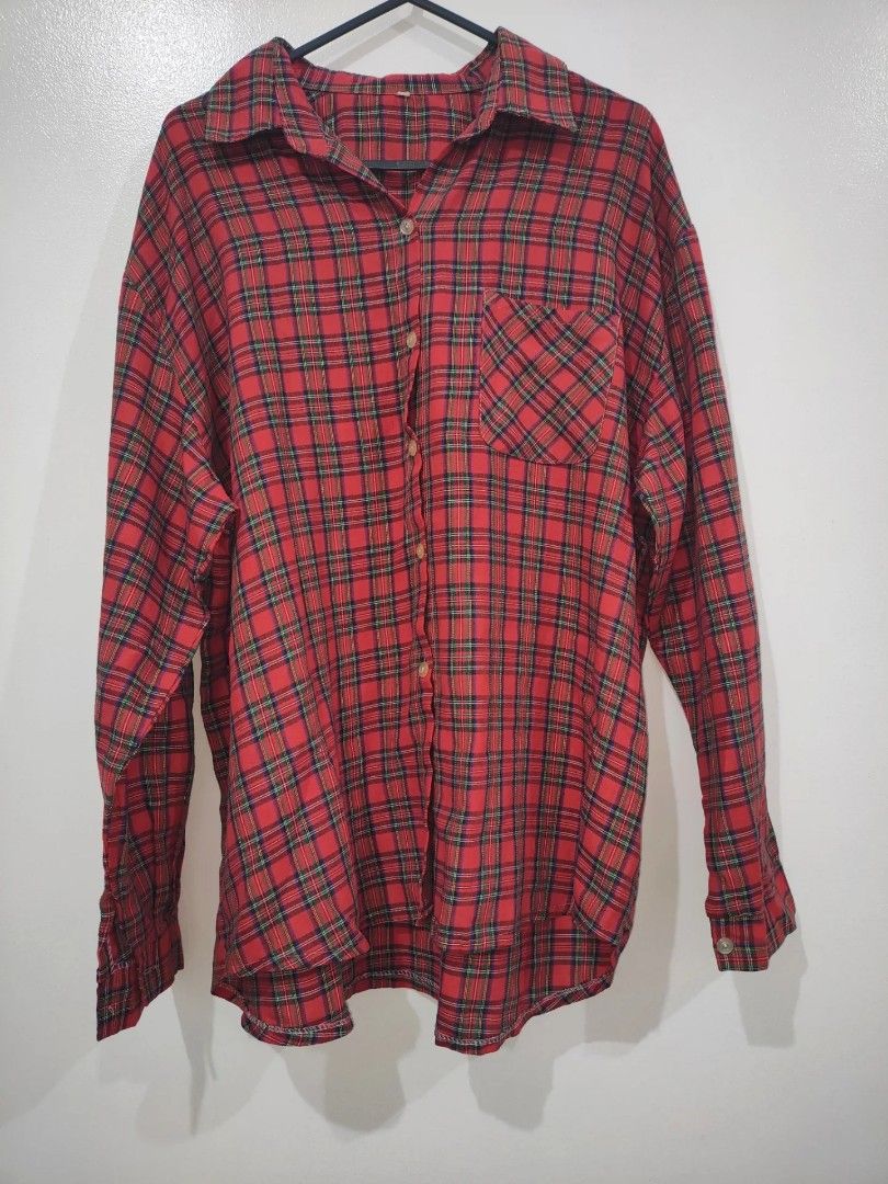 Red Plaid Long Sleeve Button Up Shirt (Category: Tshirts & Polo Shirts ) located in Quezon City. Submitted by maxsab (Listing ID 1463264777, Image 1). Description: - Classic red plaid pattern - Long sleeves with button cuffs - Single chest pocket - Button-up front - Versatile for layering or standalone wear - Comfortable and casual style.