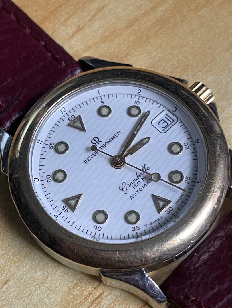 Revue Thommen Grandville (Category: Men's Watches) located in Taguig. Submitted by tester1x (Listing ID 1463174161, Image 3). Description: Secondhand Used Watch Revue Thommen Grandville Swiss Made 7614004 Automatic Textured Dial Gold Tone Bezel Stainless Steel Front Stainless Steel Back 34mm Replacement Strap, Buckle.