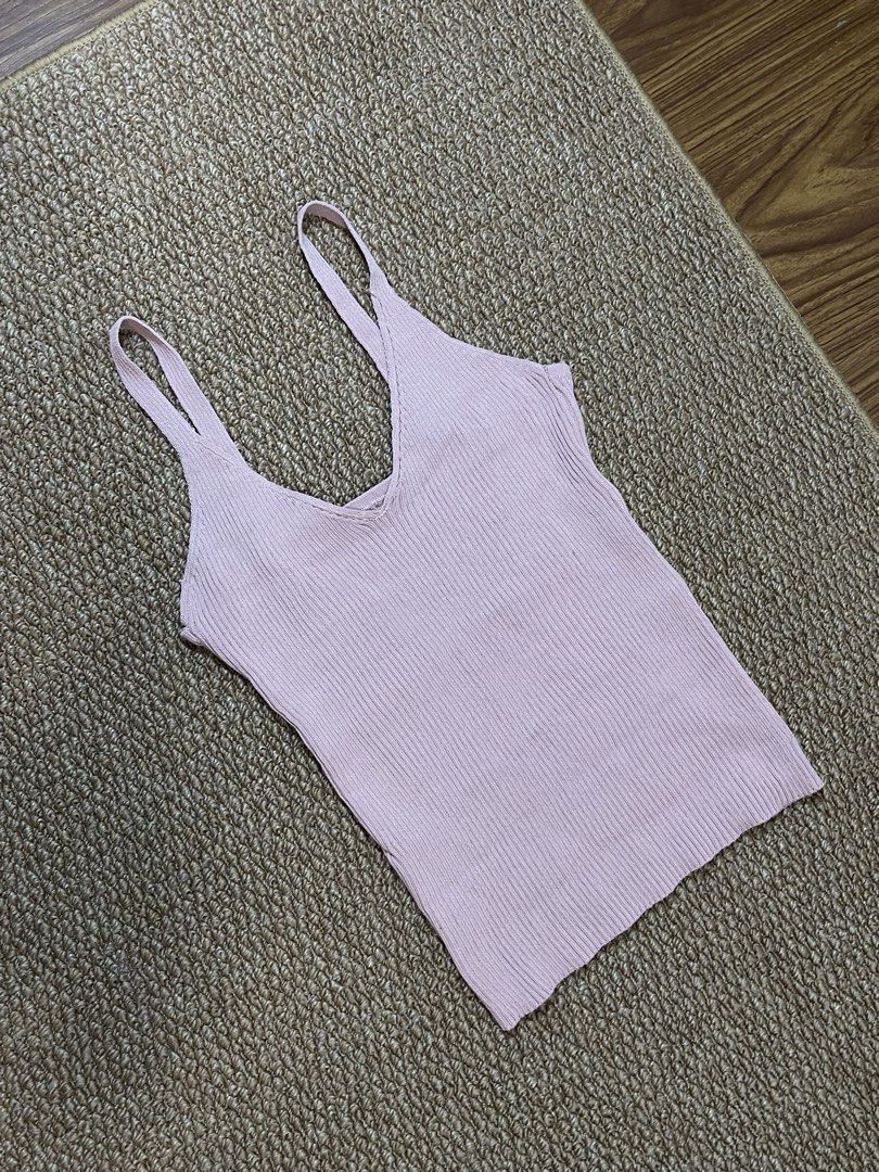 Ribbed V-Neck Tank Top (Knitted) - S (Category: Sleeveless) located in Pasig City. Submitted by miafml-closet-cleanout (Listing ID 1463143945, Image 3). Description: - fabric is super nice & flattering! - fits small frames - looks more warm pink in person posted price is fixed! will not respond to hagglers. get a discount when you get 5+ items! 💵 mop: gcash / bdo / maribank / unionbank 🛵 courier: any. this is arranged by the buyer 🙅🏻‍♀️ no re