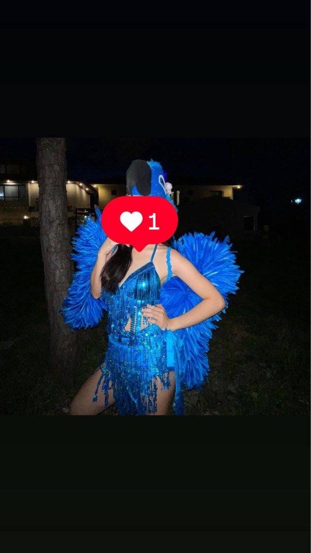 RIO Blue Feathered Bird Costume with Sequins (Category: Evening dresses & gowns) located in Binan City. Submitted by twobananas (Listing ID 1463146604, Image 1). Description: - Sparkly blue costume set - Includes sequined top, skirt, and feathered wings - Matching headpiece included - Ideal for parties or performances - Eye-catching design - Ready for your next event!.
