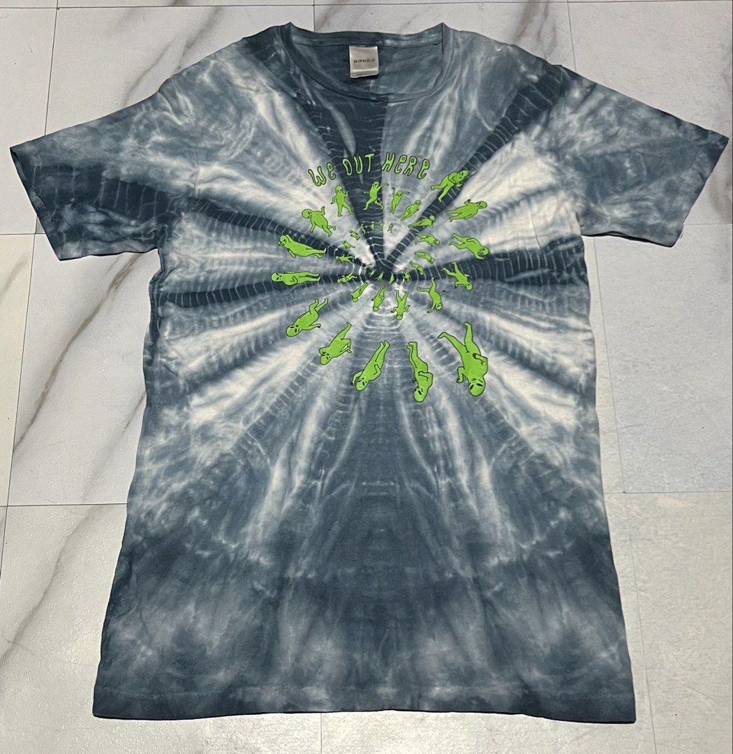RIPNDIP "We Out Here" Tie Dye T-Shirt Medium (Category: Tshirts & Polo Shirts ) located in Cavite. Submitted by christianzuuu (Listing ID 1463134295, Image 1). Description: - RIPNDIP tie-dye t-shirt - Features the "We Out Here" alien graphic - Size: Medium - Material: 100% Cotton - Made in Mexico - Perfect for casual wear or a statement piece.