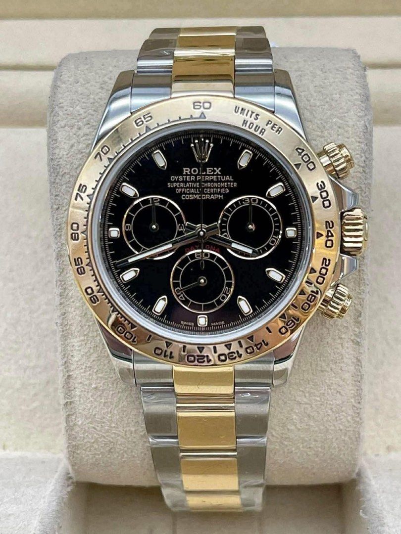 Rolex Daytona Two-Tone Black Dial Automatic Chronograph Watch (Category: Luxury Watches) located in Manila. Submitted by watchesbyjamesdy (Listing ID 1463191285, Image 1). Description: - Rolex Daytona Watch - Two-tone: Stainless Steel & 18k Yellow Gold - Dial: Black with Chronograph Sub-dials - Bezel: Tachymeter - Movement: Automatic - Bracelet: Oyster with Folding Clasp - Classic timepiece for watch enthusiasts.