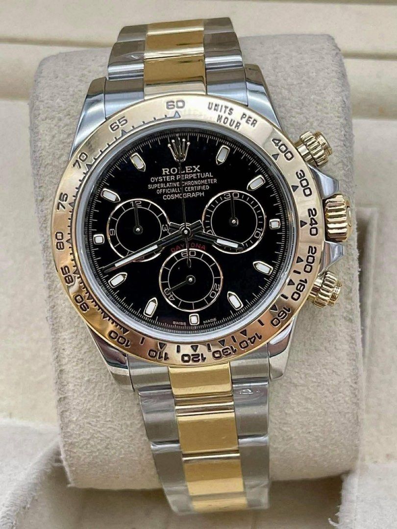 Rolex Daytona Two-Tone Black Dial Automatic Chronograph Watch (Category: Luxury Watches) located in Manila. Submitted by watchesbyjamesdy (Listing ID 1463191285, Image 2). Description: - Rolex Daytona Watch - Two-tone: Stainless Steel & 18k Yellow Gold - Dial: Black with Chronograph Sub-dials - Bezel: Tachymeter - Movement: Automatic - Bracelet: Oyster with Folding Clasp - Classic timepiece for watch enthusiasts.