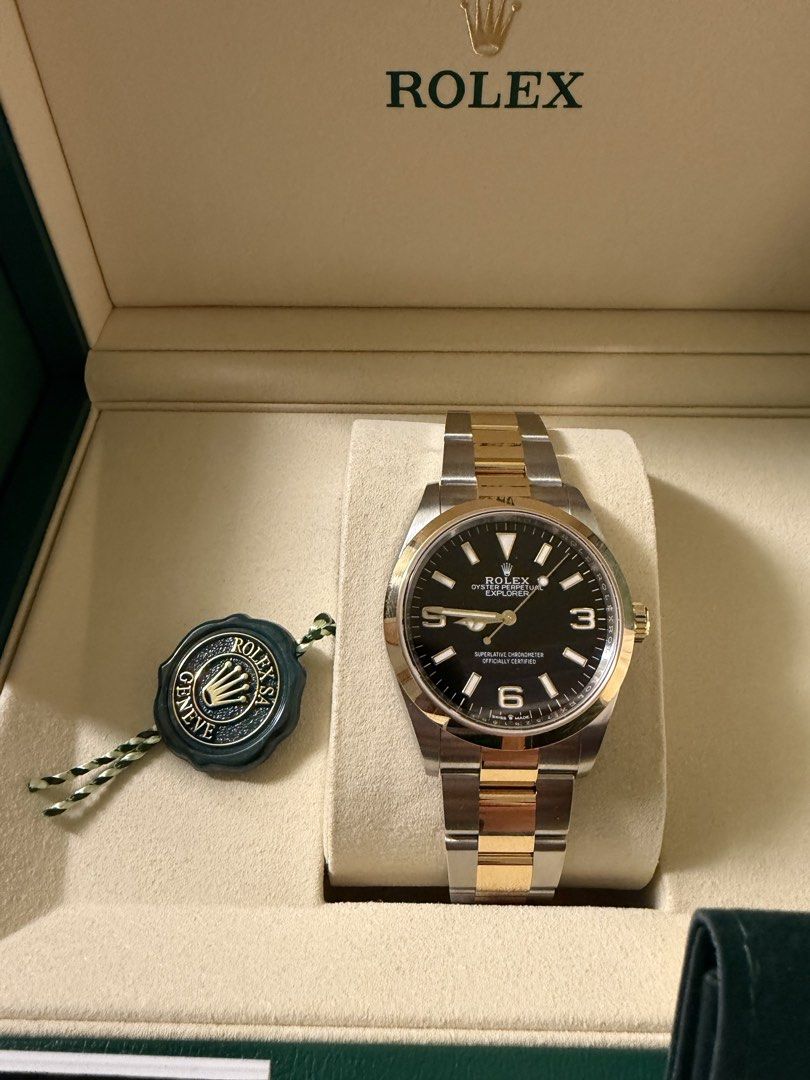 Rolex Explorer Two-Tone Watch Sept2026 (Category: Luxury Watches) located in Binan City. Submitted by collector_28 (Listing ID 1463308141, Image 1). Description: - Rolex Explorer Watch - Two-tone stainless steel and gold casing - Classic black dial - Comes with original box - Includes warranty card, valid for 5 years - Manual included - Foreign AD (Lucerne) - Special edition Rolex Lucerne spoon as a bonus!.