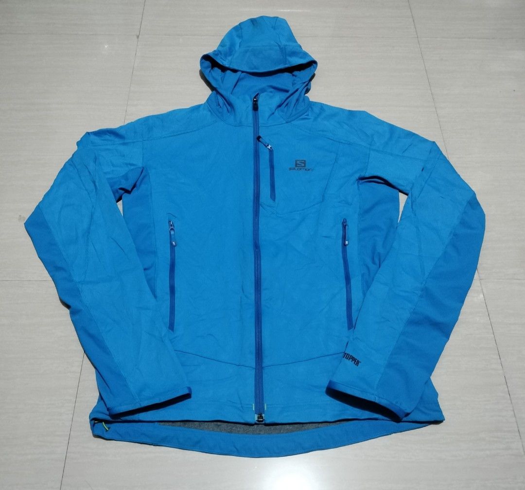 SALOMON WINDSTOPPER JACKET (Category: Coats, Jackets and Outerwear) located in Sariaya. Submitted by social_animalz (Listing ID 1463295374, Image 1). Description: 19.5 x 25 - 26.5 with cracks sa logo, dot stain sa likod( washable i guess) and may nahawa ng print sa sleeve shipping fee is not included.