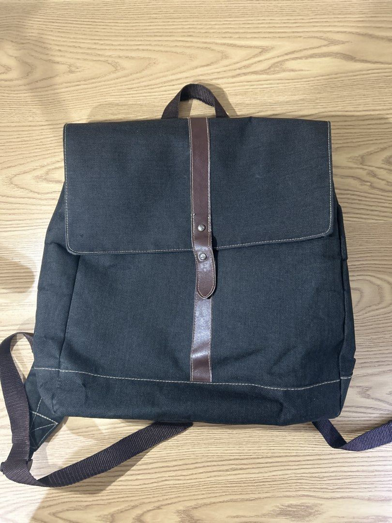 Salvatore mann Black Canvas Backpack (Category: Backpacks) located in Manila. Submitted by zealpenguin-a0aa (Listing ID 1463119400, Image 1). Description: - Durable black canvas backpack - Stylish brown leather accents - Secure flap closure with button and strap - Interior zippered pocket for essentials - Plenty of space for everyday items - Perfect for daily use.