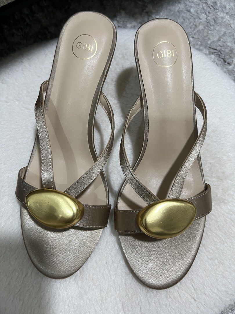 Sandals with heels (Category: Sandals) located in Pasig City. Submitted by patting18 (Listing ID 1463270312, Image 2). Description: Super nice on the feet, looks sexy Brand new with box Size 7 but fits up to 7.5 RFS: Bought for a wedding but not used. No other occasion to use it for..