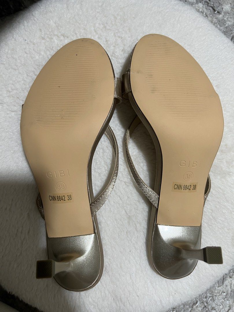 Sandals with heels (Category: Sandals) located in Pasig City. Submitted by patting18 (Listing ID 1463270312, Image 3). Description: Super nice on the feet, looks sexy Brand new with box Size 7 but fits up to 7.5 RFS: Bought for a wedding but not used. No other occasion to use it for..