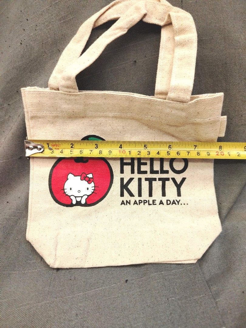 Sanrio Hello Kitty Apple Mini Tote Bag (Category: Tote Bags) located in San Fernando. Submitted by jpmarketplace2023 (Listing ID 1463257416, Image 3). Description: 💚 All items are authentic from Japan. 💛 MOP: GCash (❌️ GCash Protect) 🩵 MOD: LBC only (❌️ S. Checkout, COD, COP) 💙 Meet-up: Vista Mall, San Fernando, Pampanga 💜 All items are on-hand. 🧡 First to pay gets the item first. ❤️ Breakable items are packed with care and caution. Seller 