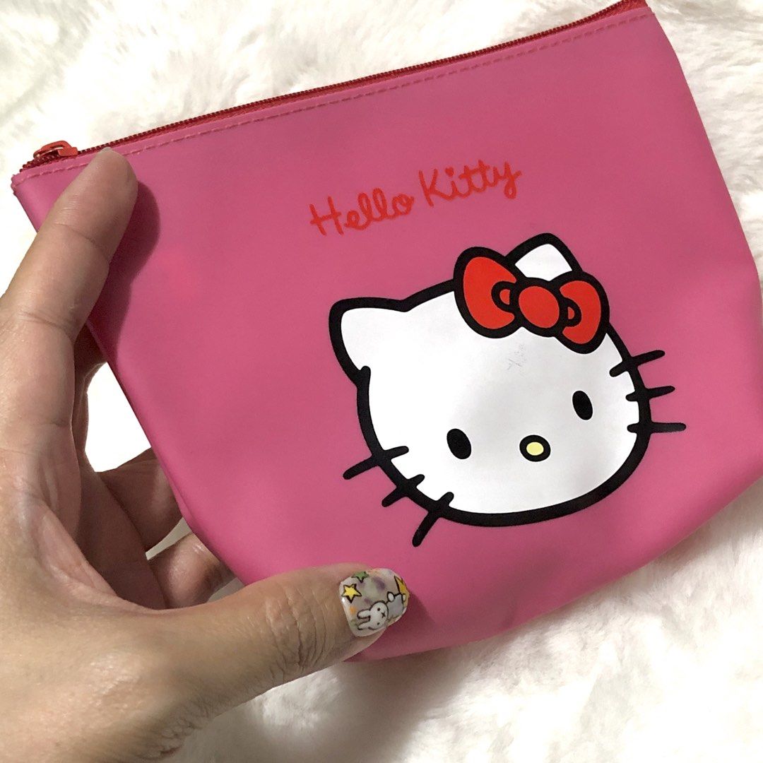 Sanrio Hello Kitty Pouch (Category: Wallets & Card holders) located in Quezon City. Submitted by kitsune.treasures (Listing ID 1463194901, Image 2). Description: *First to pay policy! *1 day reservation only. Failure to pay on time, auto cancel. 📍Quezon City * MOD: J&T | Lalamove * MOP: GCASH | BPI 📦ON HAND AND READY TO SHIP! CONDITION: WHAT YOU SEE IS WHAT YOU GET. Dimensions: Kindly check the photos for the actual measurements. Please check a