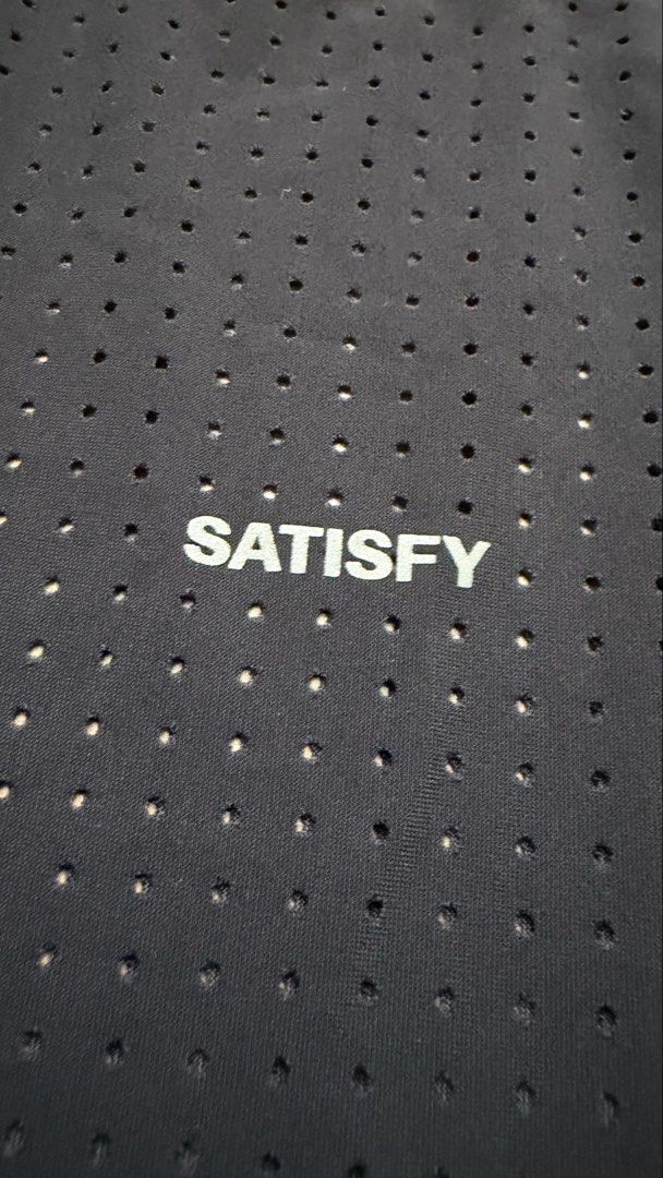 Satisfy Space-O Singlet (Category: Activewear) located in Pasig City. Submitted by noir_ (Listing ID 1463324768, Image 3). Description: handwashed only, used a few times. want to size down to XS since its a bit loose on me with tags, bags, satisfy pins, and receipt.