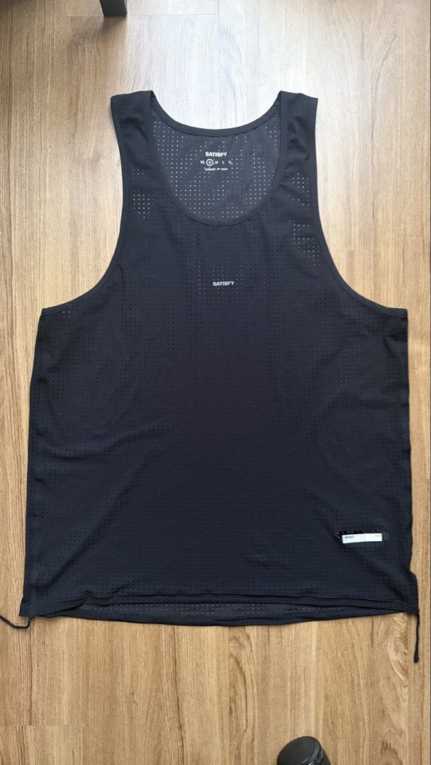 Satisfy Space-O Singlet (Category: Activewear) located in Pasig City. Submitted by noir_ (Listing ID 1463324768, Image 2). Description: handwashed only, used a few times. want to size down to XS since its a bit loose on me with tags, bags, satisfy pins, and receipt.