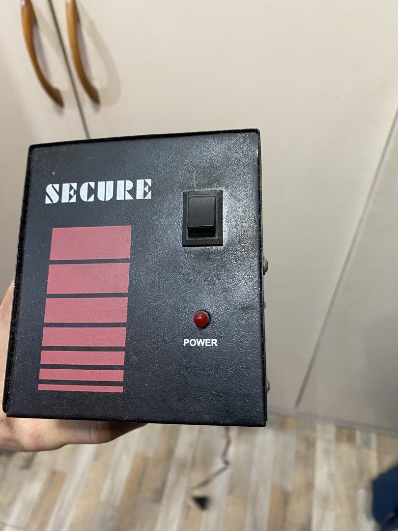 SECURE Voltage Stabilizer 220V with Fuse (Category: Other Accessories) located in Manila. Submitted by florenzzzz (Listing ID 1463231776, Image 1). Description: - SECURE Brand Voltage Stabilizer - Designed for Computer Use - Input Voltage: 220V AC - Fuse Rating: 5A - Features: Power Switch, Indicator Light, Multiple Outlets - Includes attached power cord and plug.