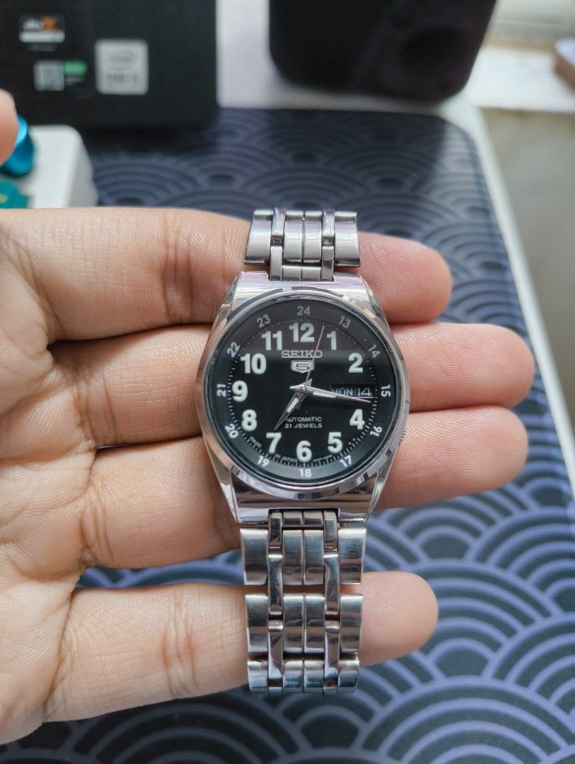 Seiko 5 Automatic Cal. 4227 (32mm Case Size) (Category: Men's Watches) located in Manila. Submitted by l4ncedeleon (Listing ID 1463281974, Image 1). Description: Seiko 5 Military Black Dial Medium Sized (Unisex) 4227-00N0 Caliber 4227 (Manual Winding and Automatic) Rare Size Original Strap fits up to 6.5 - 6.8inch wrist Condition: 9/10 Location: Imus, Cavite.