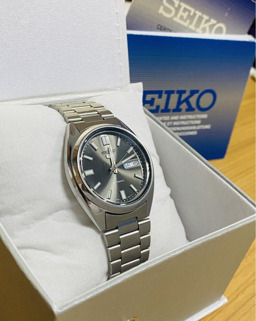 Seiko 5 Automatic Watch SNXS79K (Category: Men's Watches) located in Mabalacat. Submitted by iamyummie (Listing ID 1463210478, Image 3). Description: - Seiko 5 Automatic Watch (Model SNX579K) - Automatic Movement (Visible Case Back) - Includes Box/Hangtag/Card/Manual.