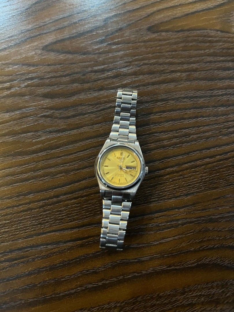 Seiko Automatic Watch Yellow Dial Day Date (Category: Luxury Watches) located in Cebu City. Submitted by jbok_watches. (Listing ID 1463261785, Image 1). Description: - Seiko Automatic Watch - Striking Yellow Dial - Day and Date Display - Durable Stainless Steel Band - Seiko Logo Clasp - Excellent Working Condition - Ready for its next owner!.