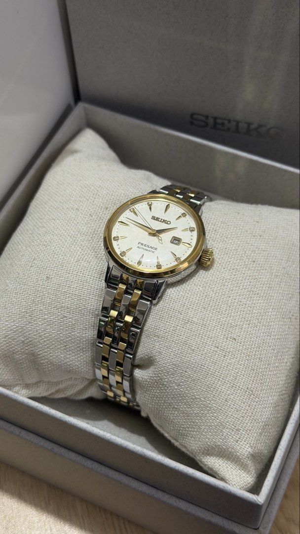 Seiko Presage SRE010J1 Automatic Two-Tone Watch 100% AUTHENTIC (Category: Luxury Watches) located in Taytay. Submitted by declutterwithvvv__ (Listing ID 1463298147, Image 1). Description: 100% AUTHENTIC Seiko Presage SRE010J1 - two-tone stainless steel case with a textured dial accented with diamond markers - with diamond certificate (pawnable) - bought last 08/2025 - original ph price: 45,000 Movement: Automatic Diameter: 30.3mm Condition: Very 