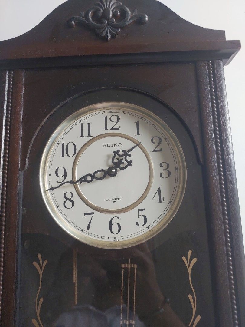 Seiko Quartz Pendulum Wall Clock (Category: Clocks) located in Bulacan. Submitted by hnbfinds (Listing ID 1463124851, Image 3). Description: Vintage Seiko Pendulum Wall Clock – Beautiful Condition 🕰️Description:Bring a touch of timeless elegance and retro charm to your home! Selling this gorgeous, vintage Seiko Pendulum Wall Clock. It features a beautifully crafted dark wooden frame, elegant gold-accented floral stenciling on the glass door, and