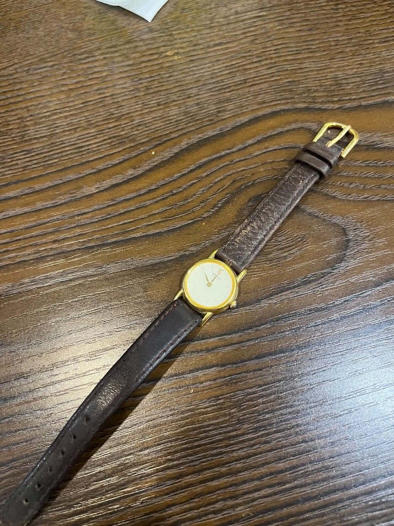 Seiko Quartz Watch Gold Tone Leather Strap (Category: Women's Watches) located in Cebu City. Submitted by jbok_watches. (Listing ID 1463258312, Image 1). Description: - Classic Seiko watch - Gold-tone case - Cream dial with Roman numerals - Quartz movement - Dark brown leather strap - Good working order - Versatile for everyday or dressy occasions.