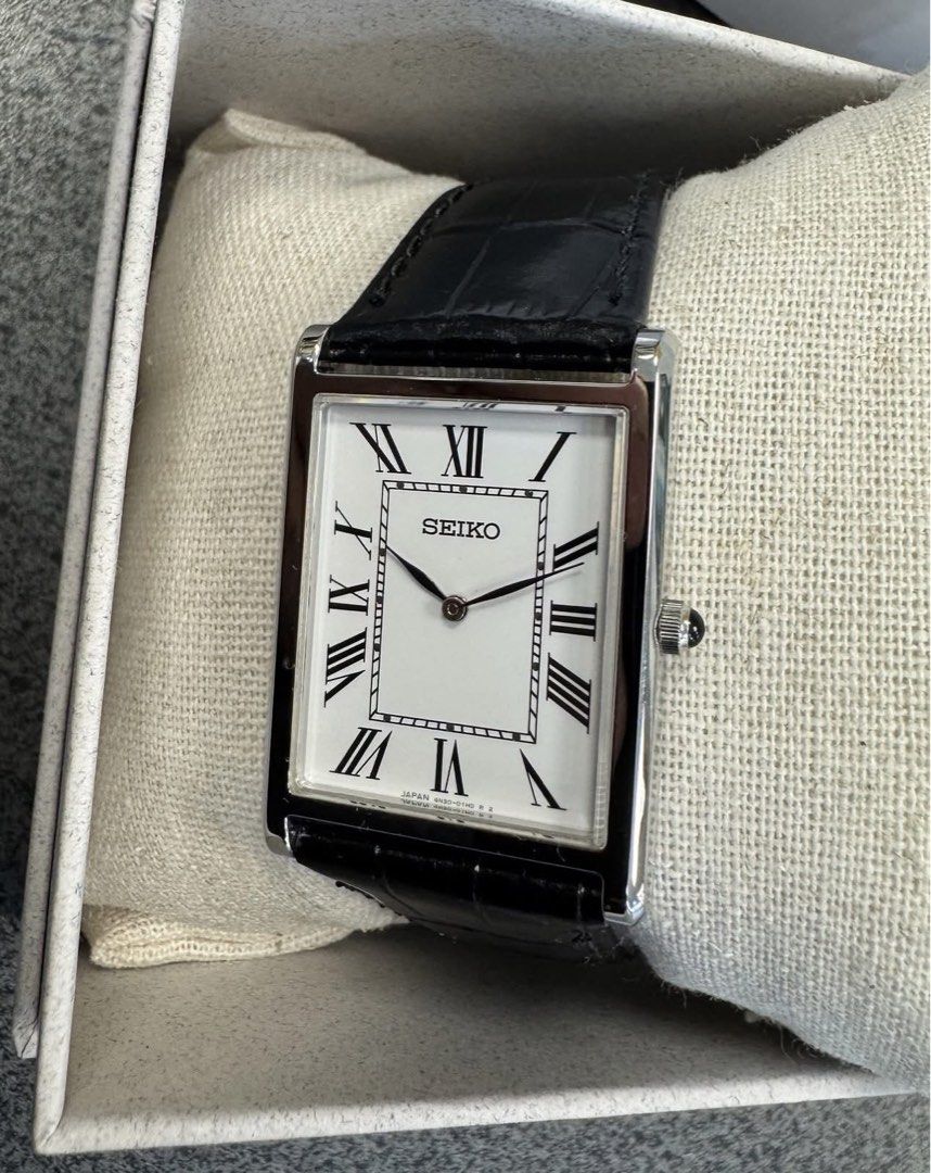 Seiko Tank SWR103 (Category: Luxury Watches) located in Manila. Submitted by seikowatchfactory (Listing ID 1463152151, Image 3). Description: BNIB 10/10 Model: SWR103 Price: 12000 pesos Specifications: Case Diameter: 27.2mm Case Thickness: 6.4mm Lug-to-lug: 39mm Lug Size: 22mm Caliber 4N30 Quartz Movement White Dial Roman Numerals Cow Leather Band Sapphire Crystal Water Resistance: 5 bar Seller is Authorized Dealer of Seiko Japanese Watches Packa