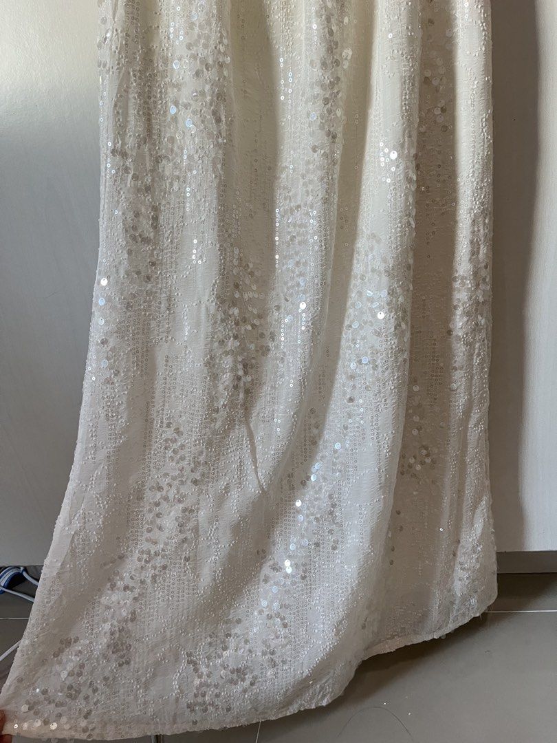 Sequins embellished maxi skirt (Category: Skirts) located in Batangas. Submitted by alita.clo (Listing ID 1463215786, Image 2). Description: off-white maxi skirt covered in delicate, shimmering tonal sequins with a comfortable elastic waistband gives off mermaid look.