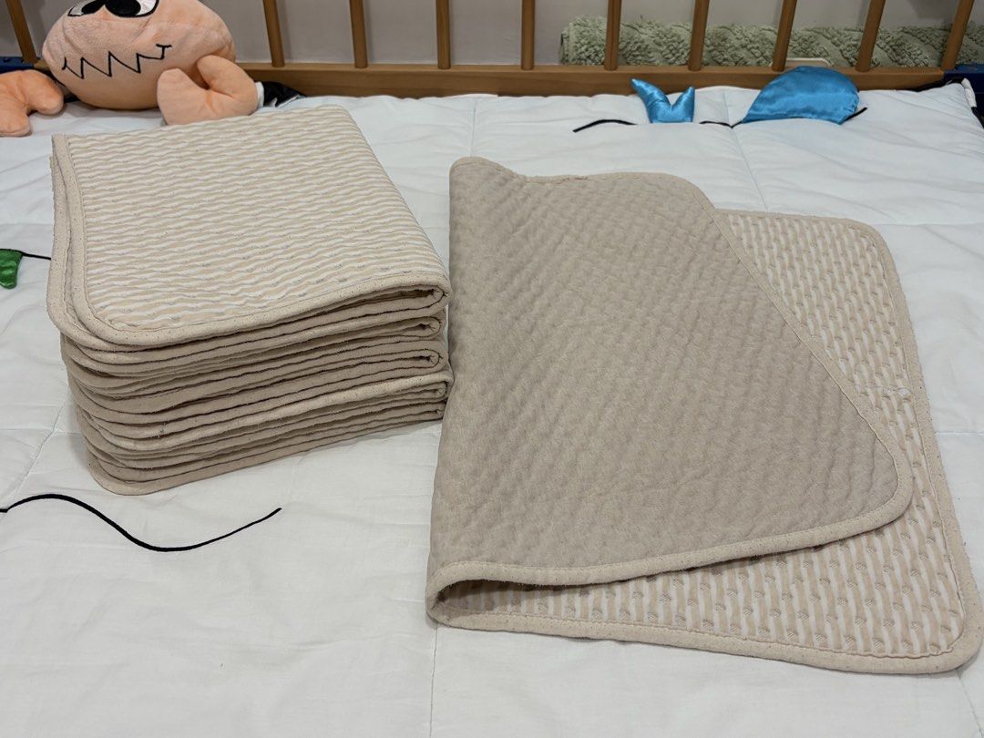 Set of 6 waterproof changing mats (Category: Changing Mats & Accessories) located in Quezon City. Submitted by abigail.tiu (Listing ID 1463232071, Image 1). Description: Well-used but in good condition, with only minor flaws, if any. Most of the mats are undamaged. Size is 50 x 70 cm. Original price: ₱150 each.