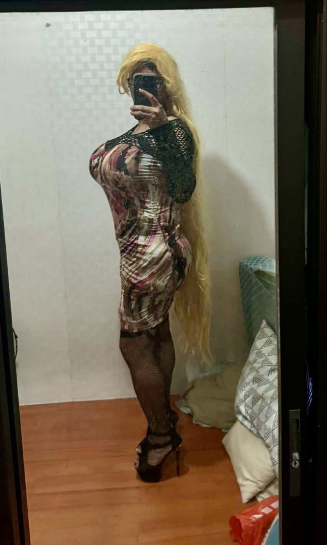 Sexy bodycon (Category: Dresses) located in Pasig City. Submitted by barbiebimbo (Listing ID 1463131768, Image 1). Description: - Long blonde wig with sheer black mesh top - Abstract print dress in pink, brown, and white - Fishnet stockings included - Black platform heels with peep toe (high heels) - Ideal for costumes or a bold fashion statement.