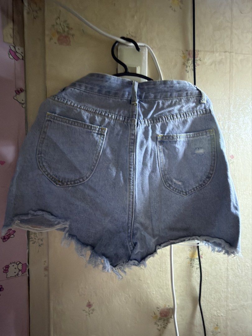 SHEIN Distressed Denim skort Size 27 (Category: Shorts) located in Marikina City. Submitted by chamscouture (Listing ID 1463139551, Image 3). Description: - SHEIN light wash denim skort - Size 27 - Distressed look with rips - Frayed hem - Classic five-pocket styling - Button and zip fly closure - Ideal for casual wear -pm when worn.