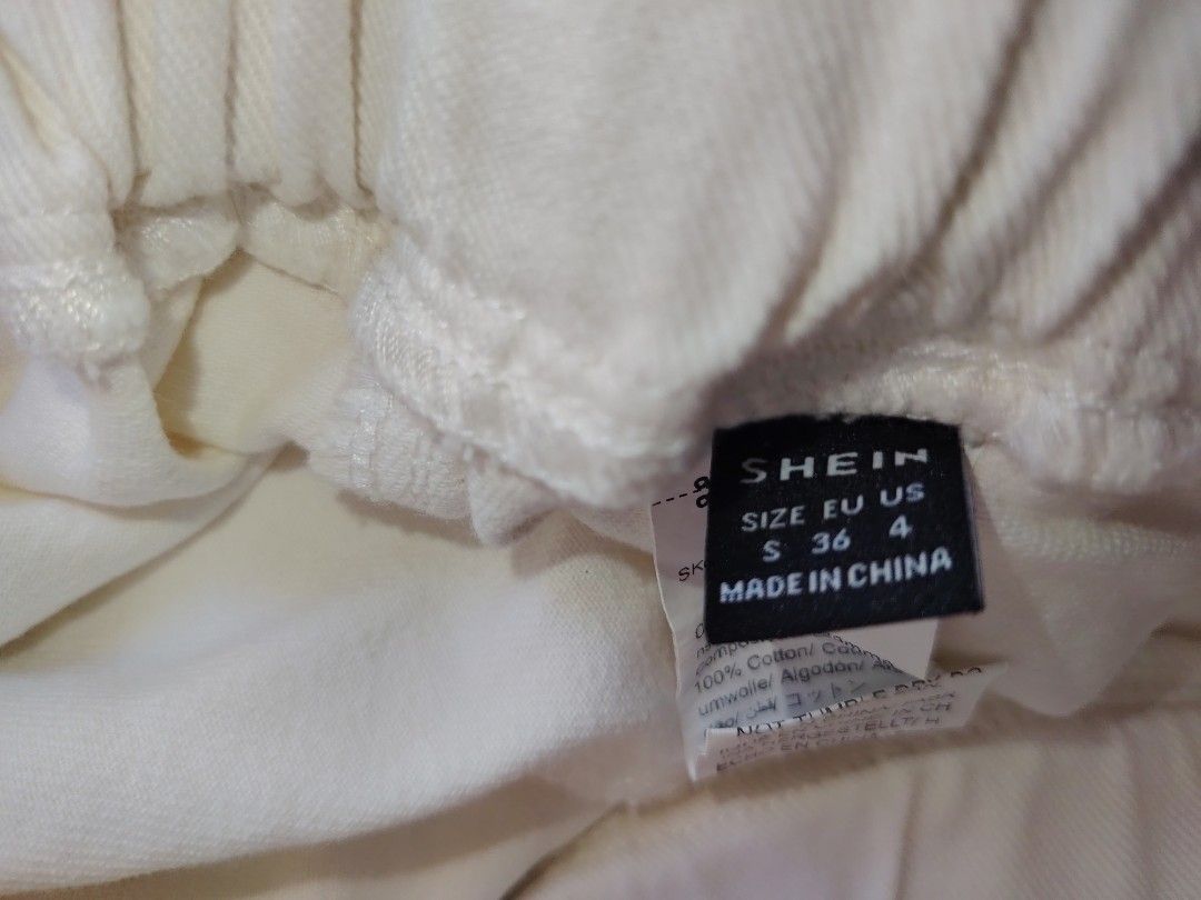 SHEIN White Cargo Jogger Pants (small on tag) (Category: Other Bottoms) located in Manila. Submitted by babeboxtheory (Listing ID 1461371168, Image 2). Description: - Stylish white cargo jogger pants - Comfortable elastic waistband with adjustable drawstring - Two convenient side pockets - Two functional cargo pockets on the legs - Trendy cuffed ankles - Perfect for everyday casual wear.