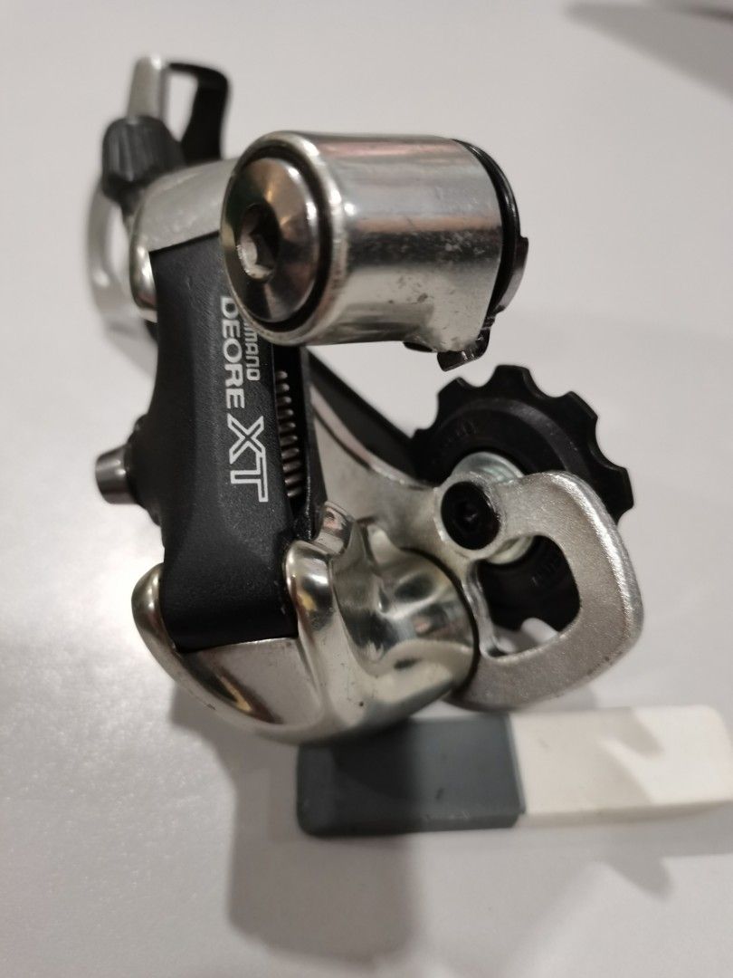 SHIMANO DEORE XT REAR DERAILLEUR NOS (Category: Bicycles) located in Bulacan. Submitted by tsunami_express (Listing ID 1463251112, Image 3). Description: Selling NOS without box. 1995 released Shimano Deore XT RD-M739 .