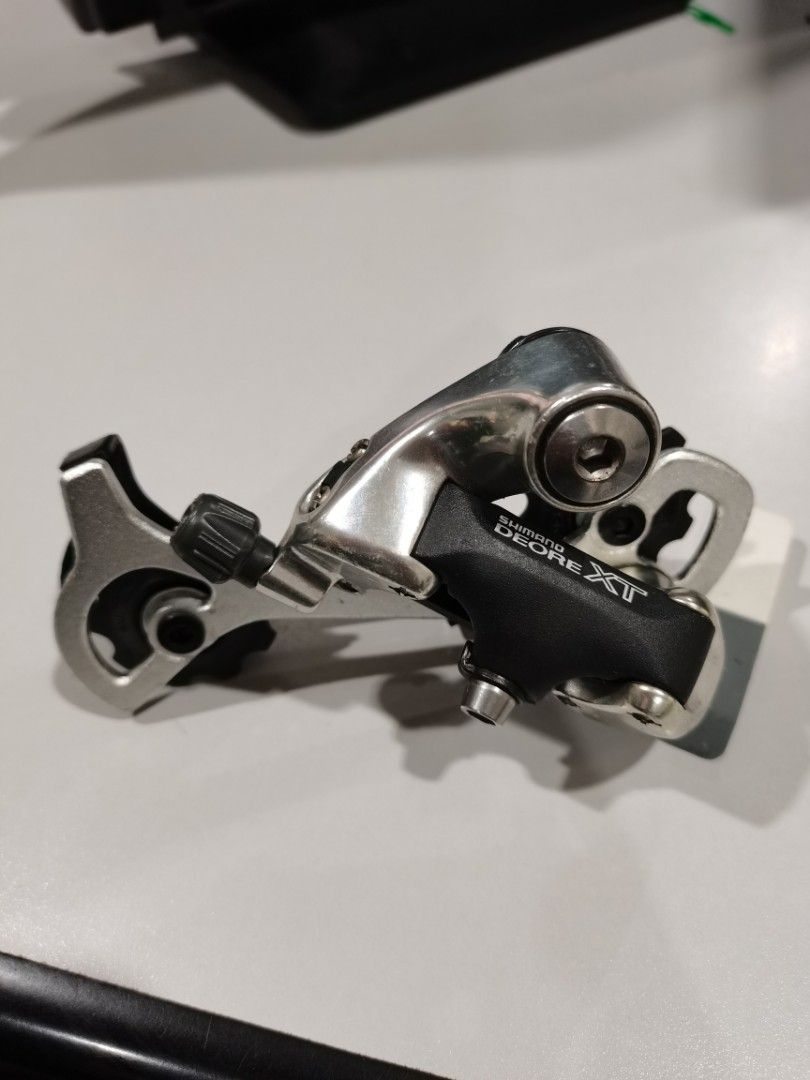 SHIMANO DEORE XT REAR DERAILLEUR NOS (Category: Bicycles) located in Bulacan. Submitted by tsunami_express (Listing ID 1463251112, Image 1). Description: Selling NOS without box. 1995 released Shimano Deore XT RD-M739 .