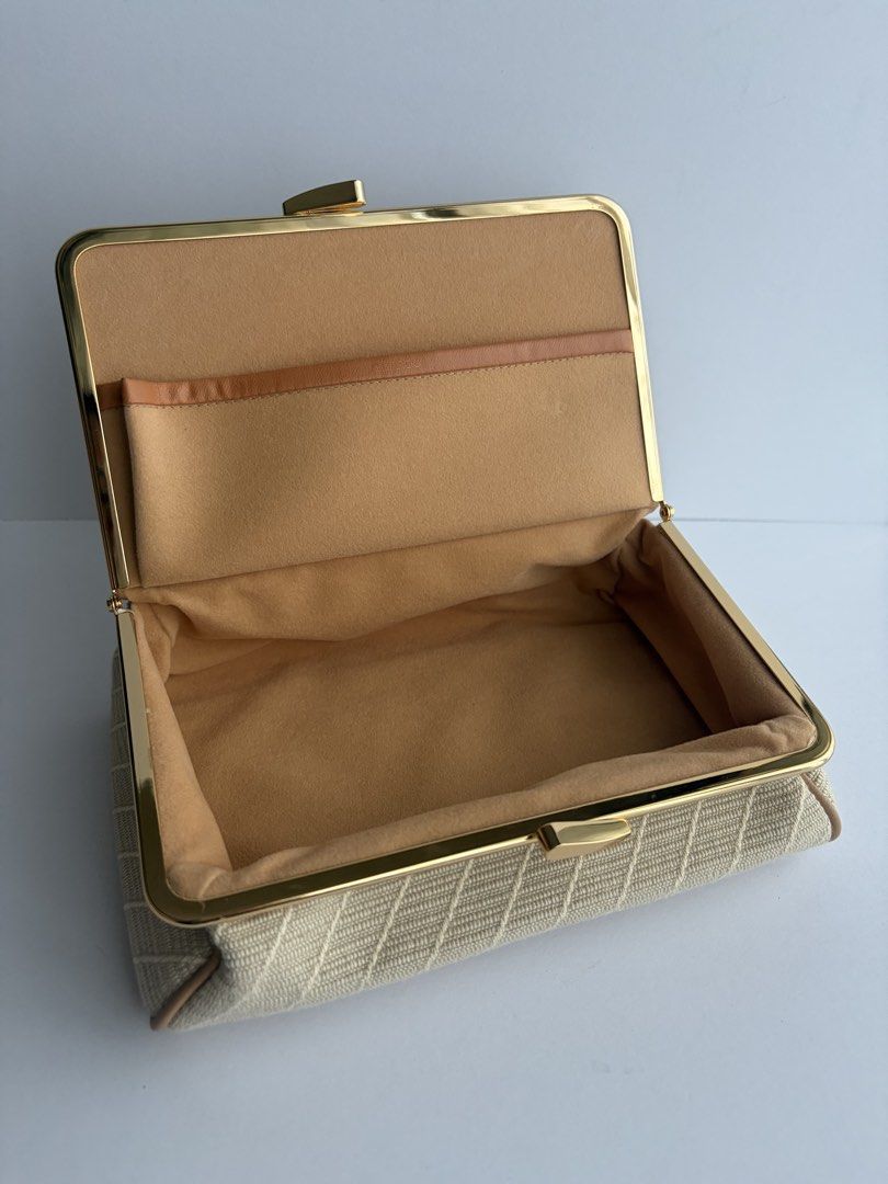 Shiseido Pouch Bag (Category: Purses & Pouches) located in Quezon City. Submitted by wagwagan_ukay_blues (Listing ID 1463220014, Image 3). Description: From Japan In very good condition L-7” W-4.5” H-2”.