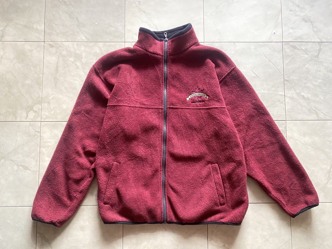 Simon Fraser Fleece Jacket (Category: Coats, Jackets and Outerwear) located in Cabuyao City. Submitted by kekjct (Listing ID 1463241027, Image 1). Description: Condition: 10/10 Size: Boxy Fit — 23” Pit-to-Pit × 27” Length (Tag L) Color: Maroon / Burgundy / Wine Red Details: • Embroidered “Simon Fraser University” maple leaf logo on chest • High-collar full-zip polar fleece construction • Elastic binding on collar, cuffs, and hem • Dual front hand