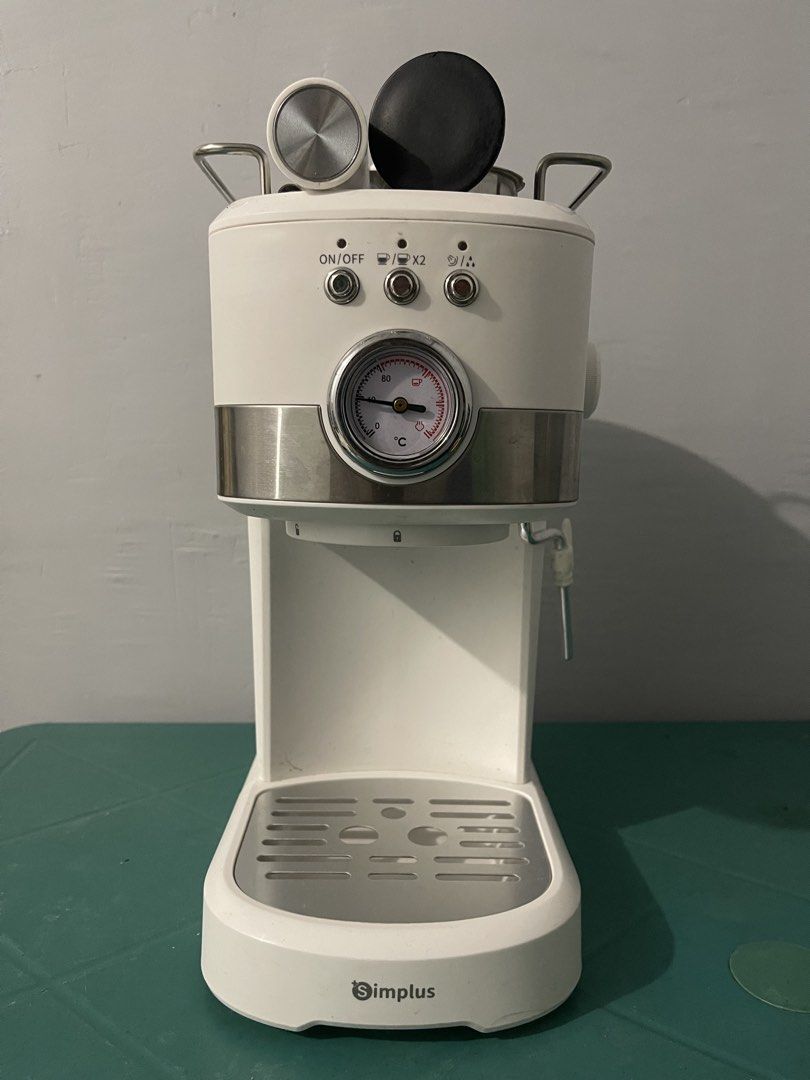 Simplus White Espresso Machine (Category: Coffee Machines & Makers) located in Manila. Submitted by ginalinettispaghetticonfetti (Listing ID 1463243679, Image 1). Description: - White Simplus espresso machine - Steam wand for frothing milk - Removable drip tray for easy cleaning - Bought early 2026 only Complete Inclusions Loc: MOA/PITX.