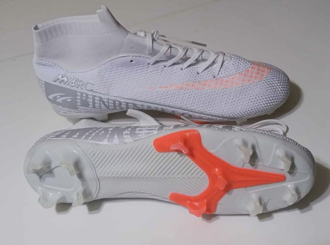 Soccer Shoes (Category: Other Sports Equipment and Supplies) located in San Jose del Monte. Submitted by jenmallari_ (Listing ID 1463148336, Image 2). Description: White with orange accent shoes Size 42 — P350 White/violet shoes Size 36 — P300 ‼️If take all P500 nalang. ✅ Brandnew but no box. 📍Muzon, SJDM, Bulacan.