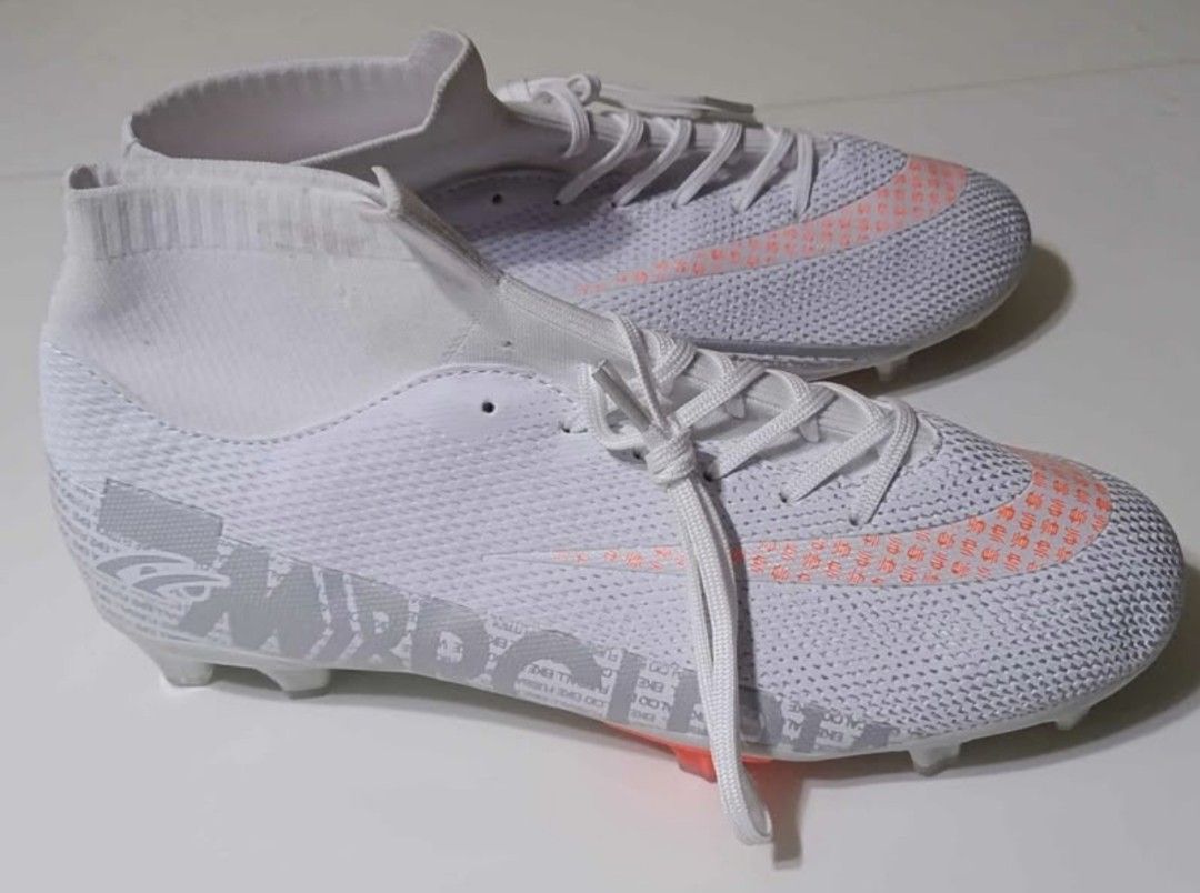 Soccer Shoes (Category: Other Sports Equipment and Supplies) located in San Jose del Monte. Submitted by jenmallari_ (Listing ID 1463148336, Image 3). Description: White with orange accent shoes Size 42 — P350 White/violet shoes Size 36 — P300 ‼️If take all P500 nalang. ✅ Brandnew but no box. 📍Muzon, SJDM, Bulacan.