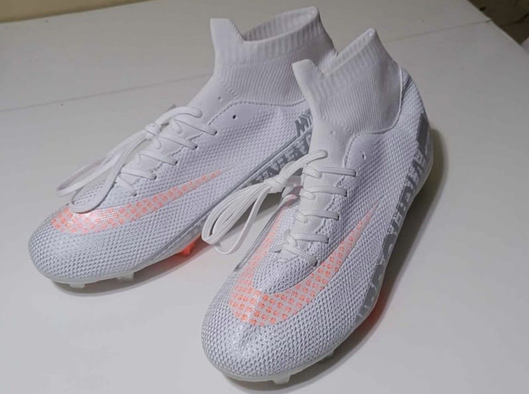 Soccer Shoes (Category: Other Sports Equipment and Supplies) located in San Jose del Monte. Submitted by jenmallari_ (Listing ID 1463148336, Image 1). Description: White with orange accent shoes Size 42 — P350 White/violet shoes Size 36 — P300 ‼️If take all P500 nalang. ✅ Brandnew but no box. 📍Muzon, SJDM, Bulacan.