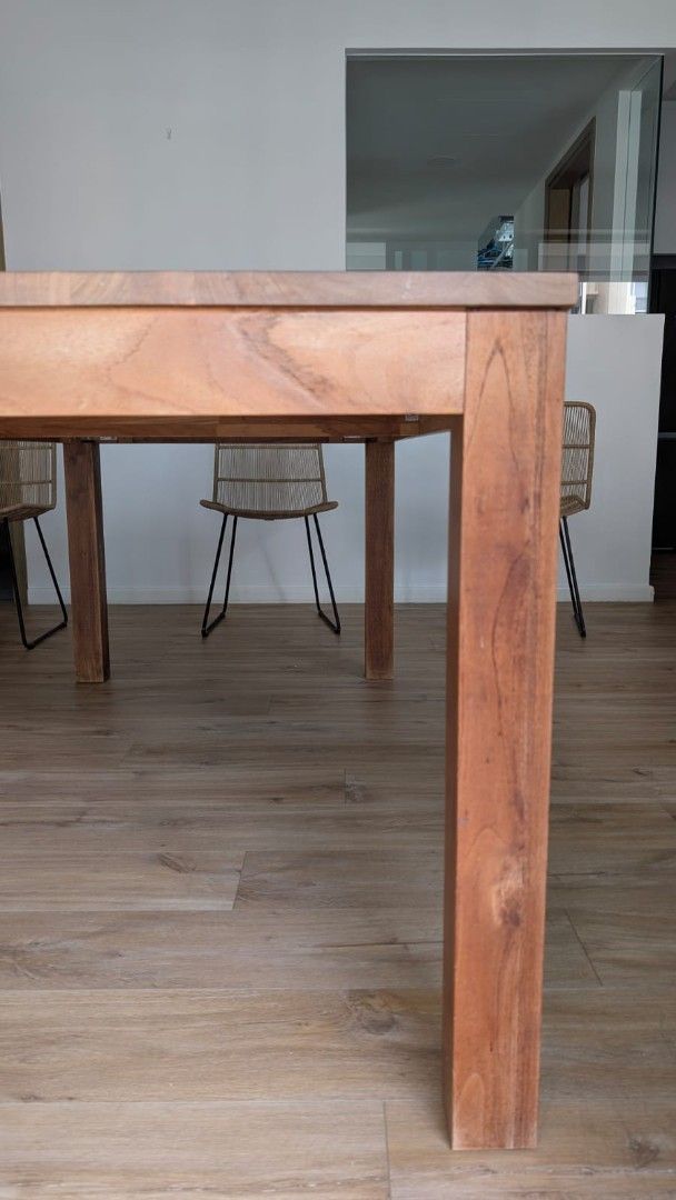 Solid Wood Dining Table (Category: Tables & Sets) located in Singapore. Submitted by vivienlm (Listing ID 1463233093, Image 2). Description: - Solid wood dining table - Natural wood grain finish - Sturdy construction with thick legs - Chairs and bench from other listings in my profile can be sold together as a bundle or separately - Perfect for family meals & entertaining - Selling due to redecoration - Pick up only.