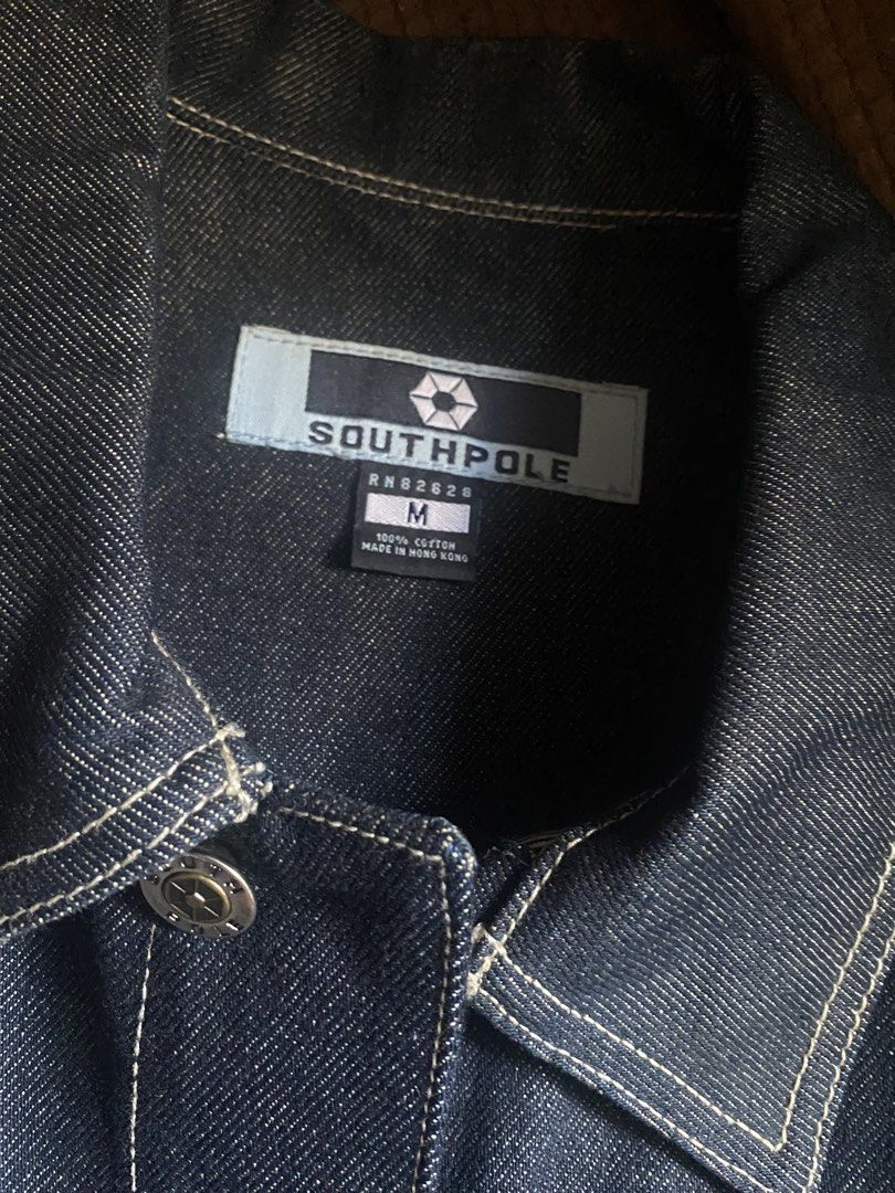 SOUTHPOLE Denim Jacket (RARE) (Category: Coats, Jackets and Outerwear) located in Manila. Submitted by wheeze_2208 (Listing ID 1463179463, Image 2). Description: -Read this before proceeding to message me - Only tried fitting it and never wore it outside - Classic dark wash denim jacket by Southpole - Features contrast stitching and embroidered logo - Button front closure - Two chest pockets - Made from 100% cotton - Versatile staple piece for an
