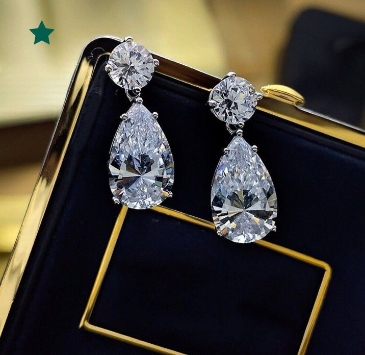 Sparkling Pear Cut Drop Earrings (Category: Earrings) located in Manila. Submitted by shine_diamond88 (Listing ID 1463323976, Image 2). Description: 2.5 ct pear cut dangle earrings lab grown diamond 14k whitegold.