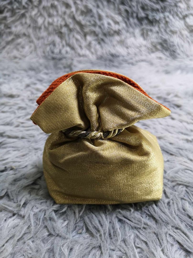 Sparkly Gold Pouch With Braided String (Category: Purses & Pouches) located in Santa Cruz. Submitted by jmy_surplus.2 (Listing ID 1463128062, Image 3). Description: Size ; L- 5.3 W - 5.4 Color ; Gold Type ; Pouch Brand ; No brand Material ; Synthetic Style ; Gold Drawstring Pouch LR 129 JMY 4 Batch #223.