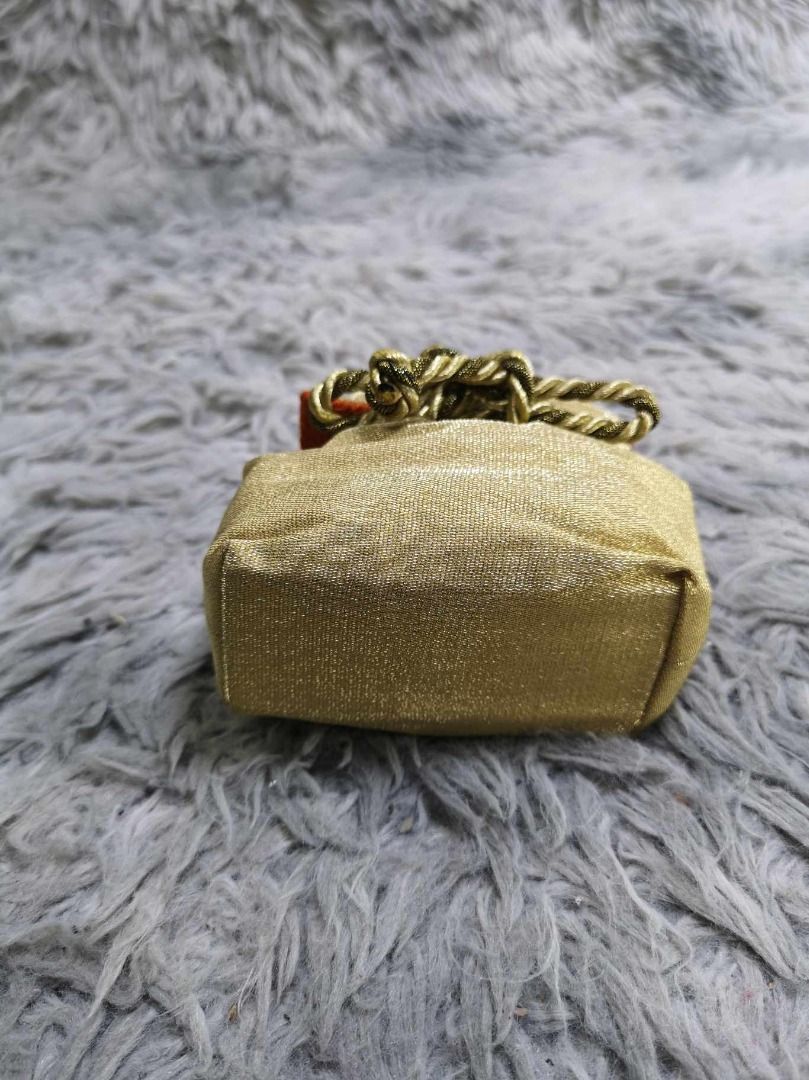 Sparkly Gold Pouch With Braided String (Category: Purses & Pouches) located in Santa Cruz. Submitted by jmy_surplus.2 (Listing ID 1463128062, Image 2). Description: Size ; L- 5.3 W - 5.4 Color ; Gold Type ; Pouch Brand ; No brand Material ; Synthetic Style ; Gold Drawstring Pouch LR 129 JMY 4 Batch #223.